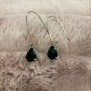 Kendra Scott black and gold tear drop earrings.